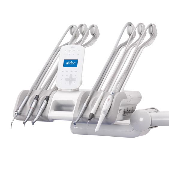 A-dec 500 dental delivery system with dentist holding instrument