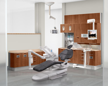 A-dec 500 dental chair with ebony upholstery in dental operatory thumb