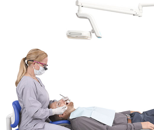 A-dec 500 LED dental light during dental procedure